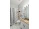 Clean bathroom with tub, shower, and granite vanity at 4534 Fern Dr, Bradenton, FL 34208
