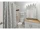 Updated bathroom with granite countertop and tub shower combo at 4534 Fern Dr, Bradenton, FL 34208