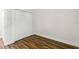 Bedroom with double door closet and wood-look floors at 4534 Fern Dr, Bradenton, FL 34208