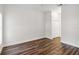 Spacious bedroom with hardwood floors and a double door closet at 4534 Fern Dr, Bradenton, FL 34208