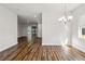 Bright dining area with wood-look floors and chandelier at 4534 Fern Dr, Bradenton, FL 34208