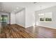Bright dining room with hardwood floors and large window at 4534 Fern Dr, Bradenton, FL 34208