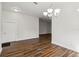 Bright dining room with hardwood floors and a chandelier at 4534 Fern Dr, Bradenton, FL 34208