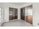 Bright screened porch with tiled floors and access to backyard at 4534 Fern Dr, Bradenton, FL 34208