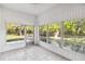 Peaceful screened porch with tiled floors and backyard views at 4534 Fern Dr, Bradenton, FL 34208