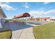 Community shuffleboard courts with covered seating at 4534 Fern Dr, Bradenton, FL 34208