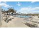 Relaxing community pool with lounge chairs at 4534 Fern Dr, Bradenton, FL 34208