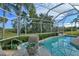 Relaxing pool and spa area with lush landscaping at 4617 Samoset Dr, Sarasota, FL 34241