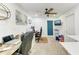 Home office with two workspaces, ceiling fan, and ample natural light at 511 E 65Th Ave, Bradenton, FL 34203