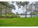 Serene backyard view overlooking a tranquil pond and natural landscape at 5469 Fair Oaks Street St # 5C, Bradenton, FL 34203