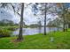 Peaceful backyard oasis with pond view and lush landscaping at 5469 Fair Oaks Street St # 5C, Bradenton, FL 34203