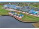 Community clubhouse with tennis courts and pool at 5469 Fair Oaks Street St # 5C, Bradenton, FL 34203