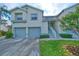 Two-story condo with two-car garage, and nicely landscaped lawn at 5469 Fair Oaks Street St # 5C, Bradenton, FL 34203