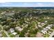 Wide shot aerial view of the neighborhood and surrounding area at 5575 Beneva Woods Cir, Sarasota, FL 34233