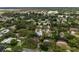 Aerial view of the home and the surrounding community at 5575 Beneva Woods Cir, Sarasota, FL 34233