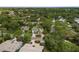 Wide aerial showcasing the home and surrounding neighborhood at 5575 Beneva Woods Cir, Sarasota, FL 34233