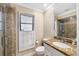 Bathroom with a shower, toilet, and vanity at 5575 Beneva Woods Cir, Sarasota, FL 34233