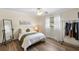 Cozy bedroom with a full bed and plenty of closet space at 5575 Beneva Woods Cir, Sarasota, FL 34233