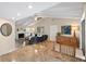 Living room with vaulted ceiling and fireplace at 5575 Beneva Woods Cir, Sarasota, FL 34233