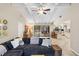 Open living room with pool views and kitchen access at 5575 Beneva Woods Cir, Sarasota, FL 34233