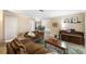 Living room features comfortable seating and views into the dining area at 5575 Beneva Woods Cir, Sarasota, FL 34233
