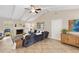 Living room features vaulted ceilings and tiled floors at 5575 Beneva Woods Cir, Sarasota, FL 34233