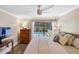 Main bedroom with pool view and walk-in closet at 5575 Beneva Woods Cir, Sarasota, FL 34233