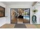 Patio with sliding doors leading to living room and pool access at 5575 Beneva Woods Cir, Sarasota, FL 34233