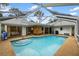 Inviting screened-in pool with ample surrounding space at 5575 Beneva Woods Cir, Sarasota, FL 34233