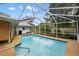 Refreshing screened-in pool perfect for relaxation at 5575 Beneva Woods Cir, Sarasota, FL 34233