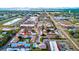 Breathtaking aerial view of a charming coastal community featuring pristine pools and lush landscaping at 6238 7Th W Ave # 6238, Bradenton, FL 34209