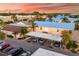 Aerial view of condo community showing building exteriors, parking, and landscaping at 6238 7Th W Ave # 6238, Bradenton, FL 34209