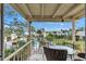 Relaxing balcony view overlooking the community pool and lush landscaping at 6238 7Th W Ave # 6238, Bradenton, FL 34209