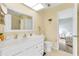Bathroom with white vanity, toilet and shower/tub combo at 6238 7Th W Ave # 6238, Bradenton, FL 34209