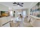 Living Room with light colored sofa and access to balcony at 6238 7Th W Ave # 6238, Bradenton, FL 34209