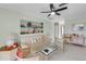 Cozy living room featuring comfortable seating and large artwork at 6238 7Th W Ave # 6238, Bradenton, FL 34209