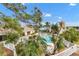 Refreshing community pool with surrounding patio furniture at 6238 7Th W Ave # 6238, Bradenton, FL 34209