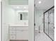 Updated bathroom with white vanity and marble shower at 6401 Pelican Dr # 80A, Bradenton, FL 34210