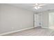Spacious bedroom with neutral walls and new flooring at 6401 Pelican Dr # 80A, Bradenton, FL 34210