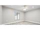 Bright bedroom with ceiling fan and hardwood flooring at 6401 Pelican Dr # 80A, Bradenton, FL 34210