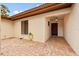 Courtyard entry with brick pavers and exterior lighting at 6401 Pelican Dr # 80A, Bradenton, FL 34210