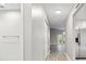 Clean hallway with new flooring and neutral paint at 6401 Pelican Dr # 80A, Bradenton, FL 34210