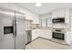 Updated kitchen, featuring stainless steel appliances at 6401 Pelican Dr # 80A, Bradenton, FL 34210