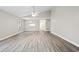 Spacious living room with hardwood flooring and vaulted ceiling at 6401 Pelican Dr # 80A, Bradenton, FL 34210