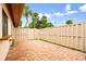 Brick paved patio with a private fenced-in backyard at 6401 Pelican Dr # 80A, Bradenton, FL 34210