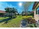 Spacious backyard with lush landscaping and relaxing seating area at 6739 Haverhill Ct, Lakewood Ranch, FL 34202