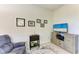 Den with a flat-screen TV and media console at 6739 Haverhill Ct, Lakewood Ranch, FL 34202