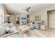 Living room with comfortable seating and a flat screen TV at 6739 Haverhill Ct, Lakewood Ranch, FL 34202