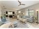 Spacious living room with a view of the kitchen and dining area at 6739 Haverhill Ct, Lakewood Ranch, FL 34202