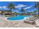 Community resort-style pool with lounge chairs at 6739 Haverhill Ct, Lakewood Ranch, FL 34202
